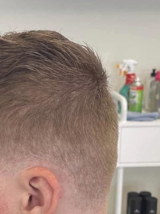 After: a short, textured men’s cut with faded sides